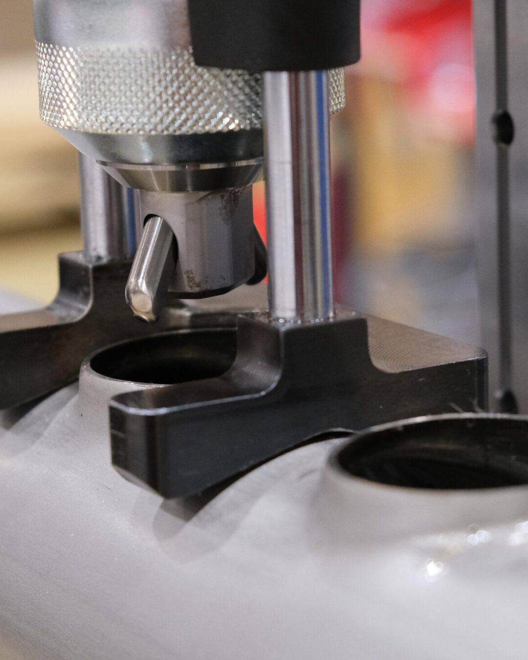 Portable collaring machine pulling a tee